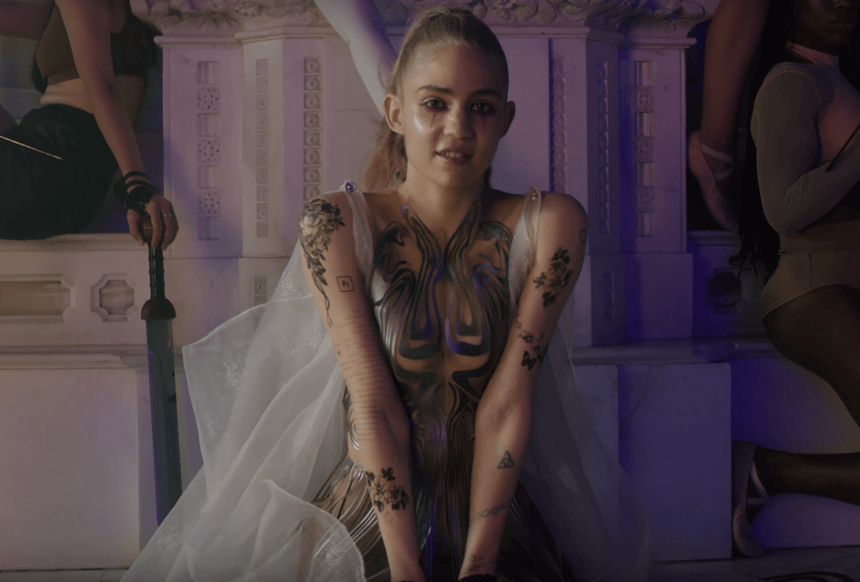 Grimes returns with new 'Violence' video.